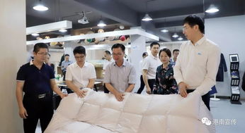 港南區(qū)區(qū)長(zhǎng)到杭州招商 促進(jìn)企業(yè)間合作 發(fā)展壯大羽絨產(chǎn)業(yè)